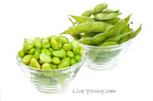 Edamame soy beans shelled and with pods in bowls